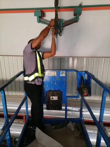 Our electrical engineer working on an installation