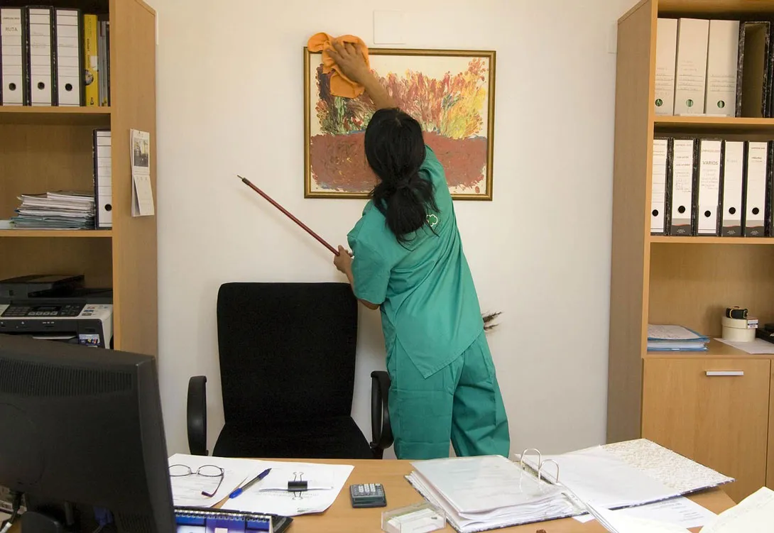 A cleaning staff in an office